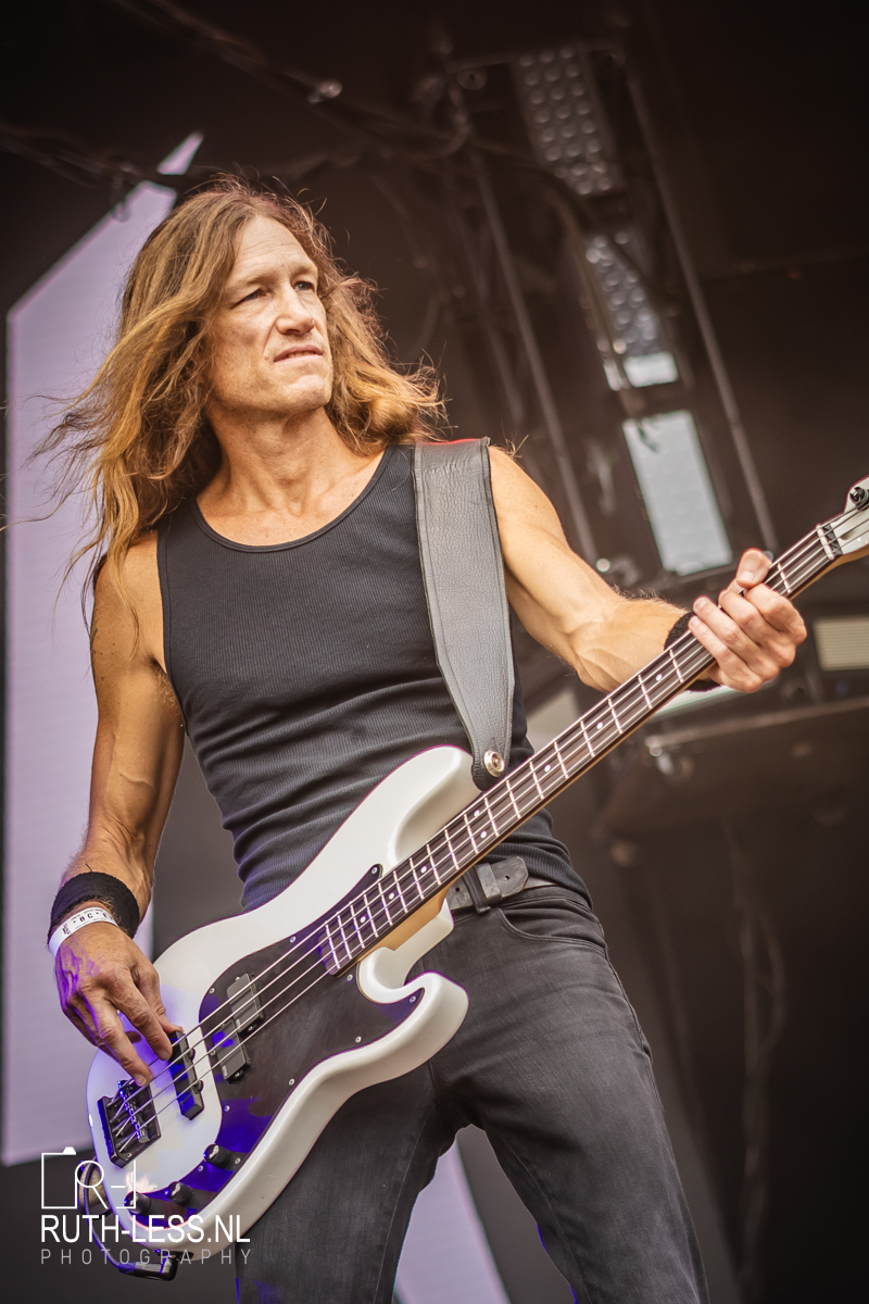 Damien Sisson playing bass